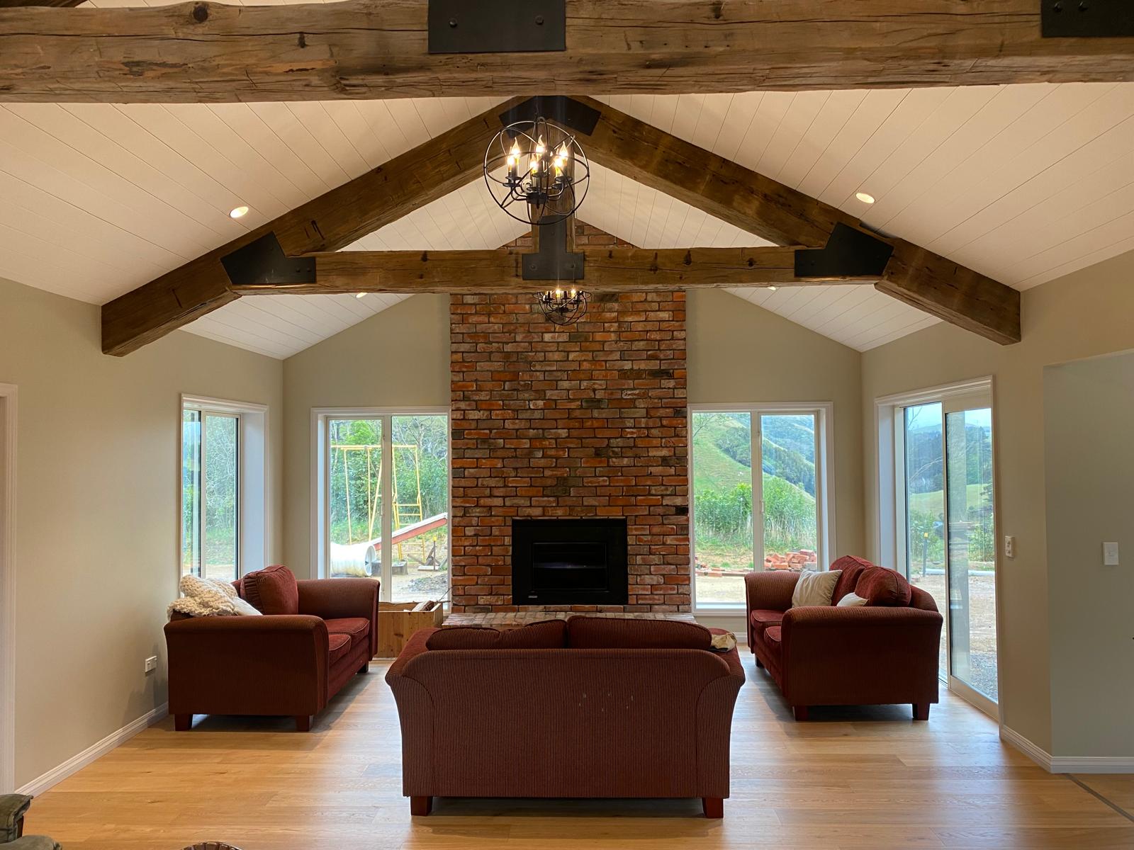 Living room with a brick fireplace